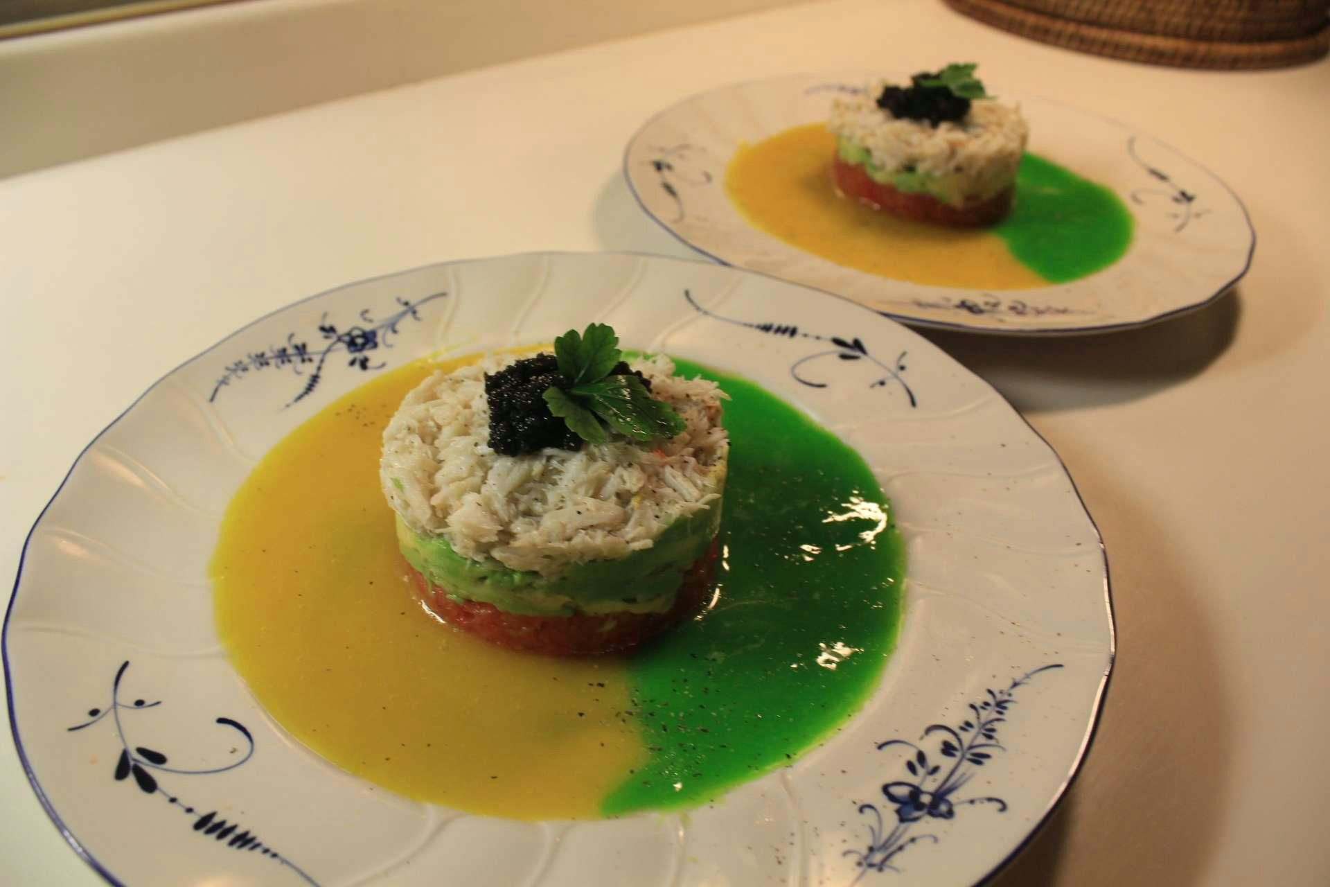 a couple of plates of food aboard ASPIRATION Yacht for Charter