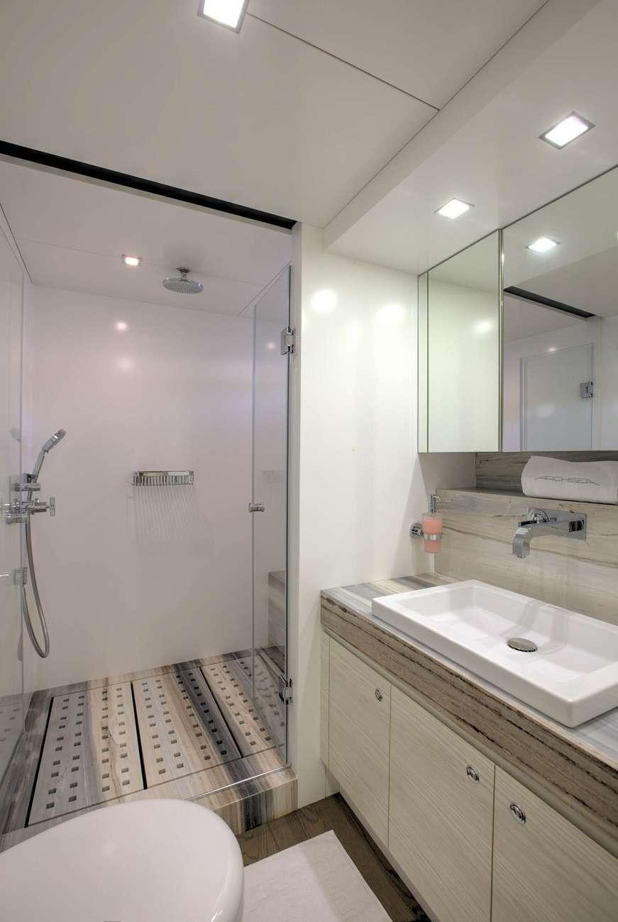 a bathroom with a sink and a toilet aboard ARCHSEA Yacht for Charter