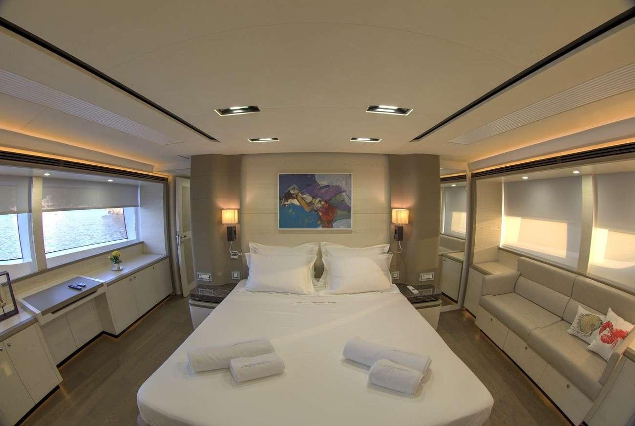 a large bedroom with a large bed aboard ARCHSEA Yacht for Charter