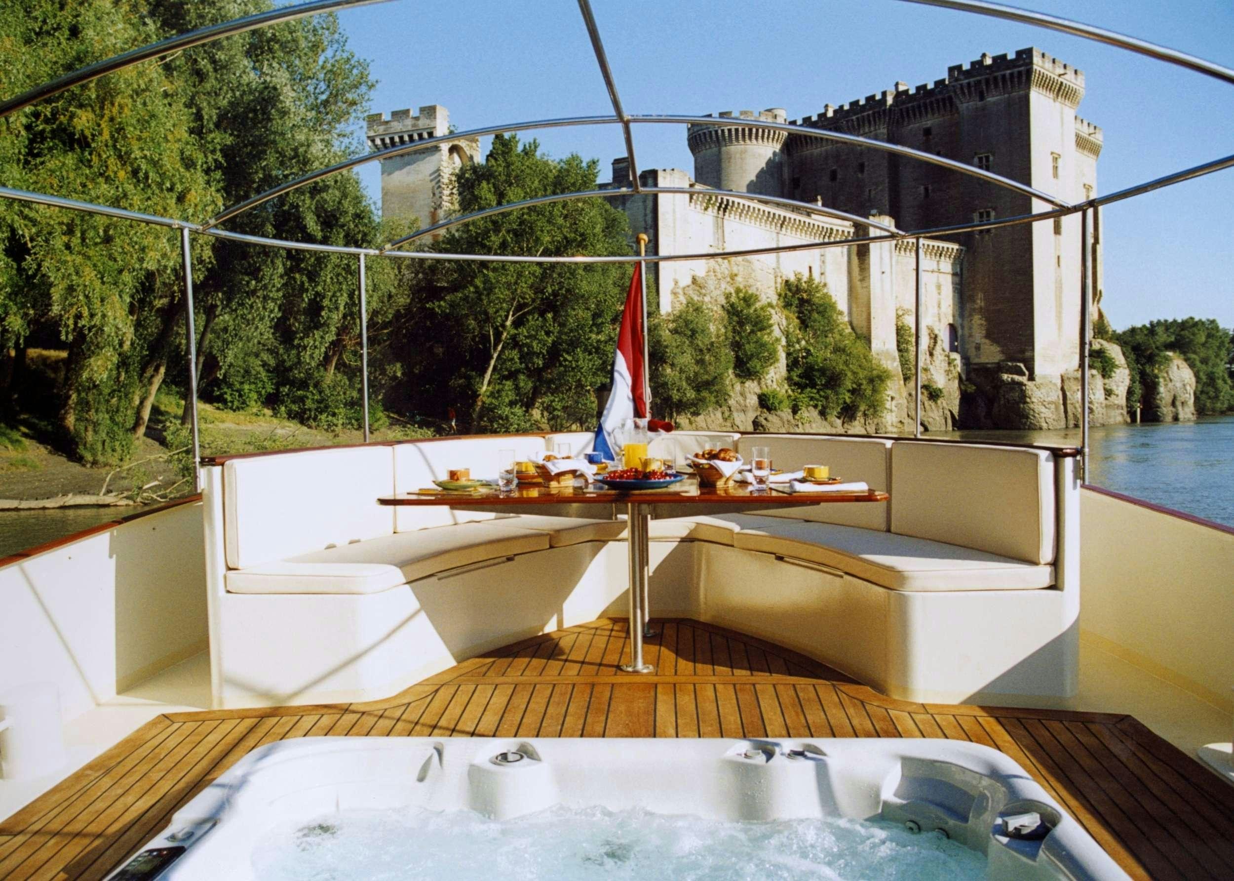 a boat on a body of water aboard ROI SOLEIL Yacht for Charter