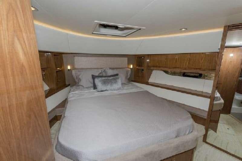 a room with two beds aboard BETTER BOAT Yacht for Charter