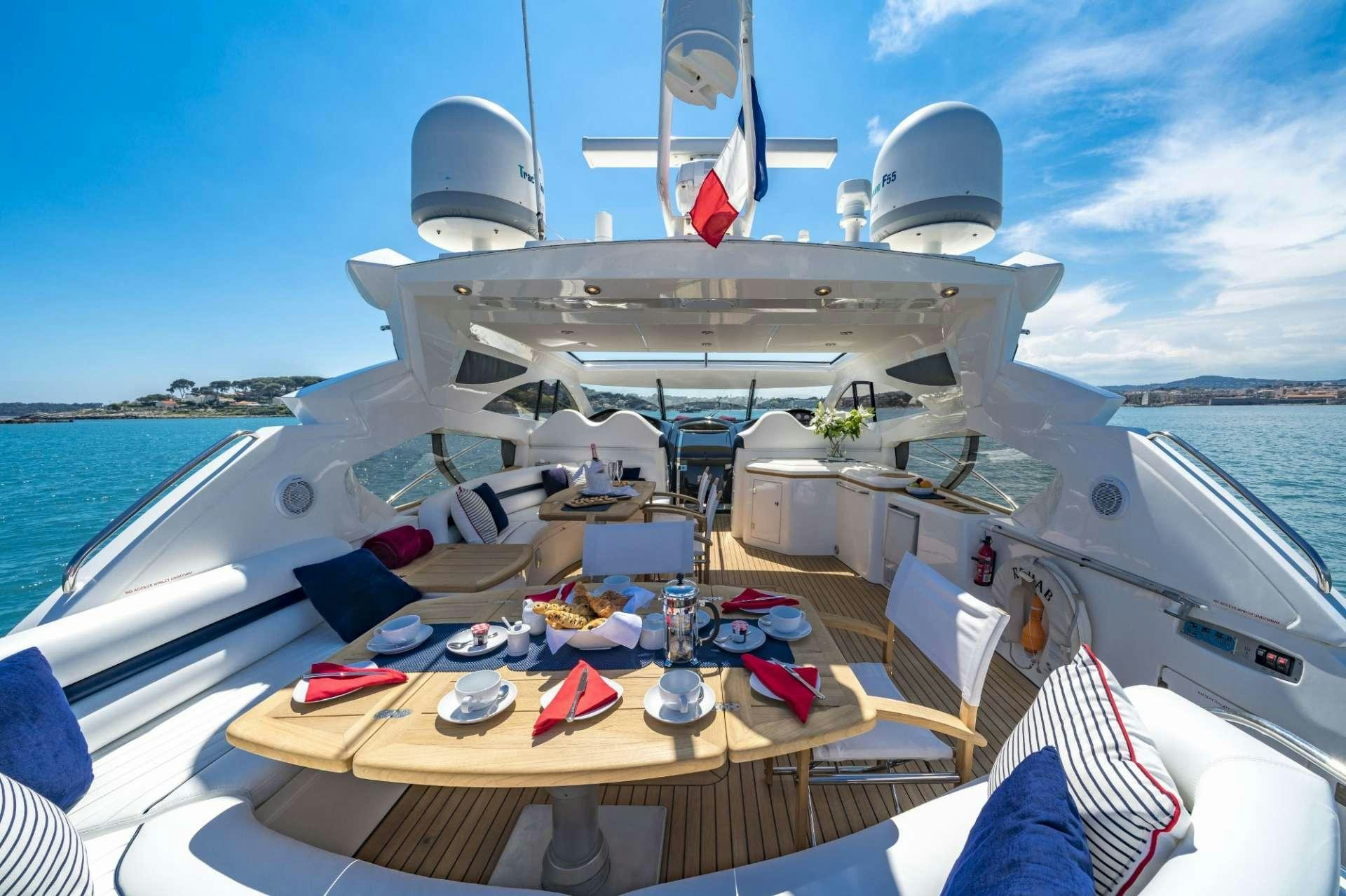 a boat on the water aboard REHAB Yacht for Charter