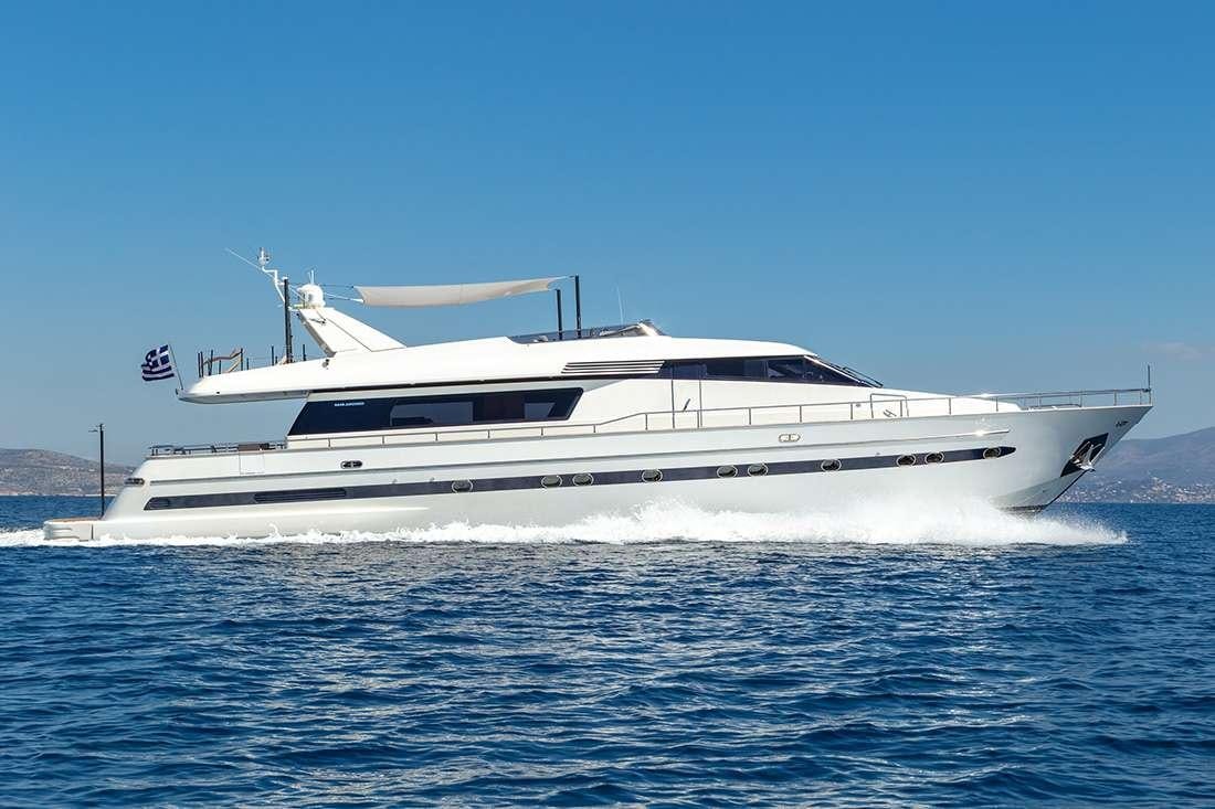 a white boat in the water aboard THE BIRD Yacht for Charter