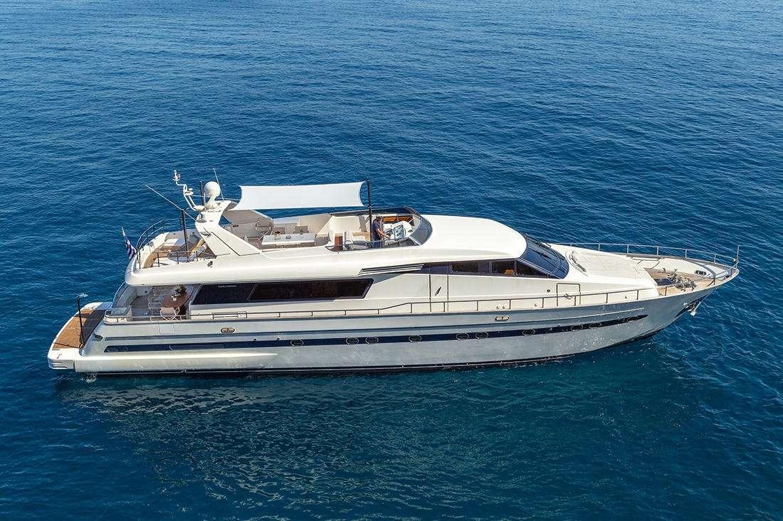 a white boat in the water aboard THE BIRD Yacht for Charter