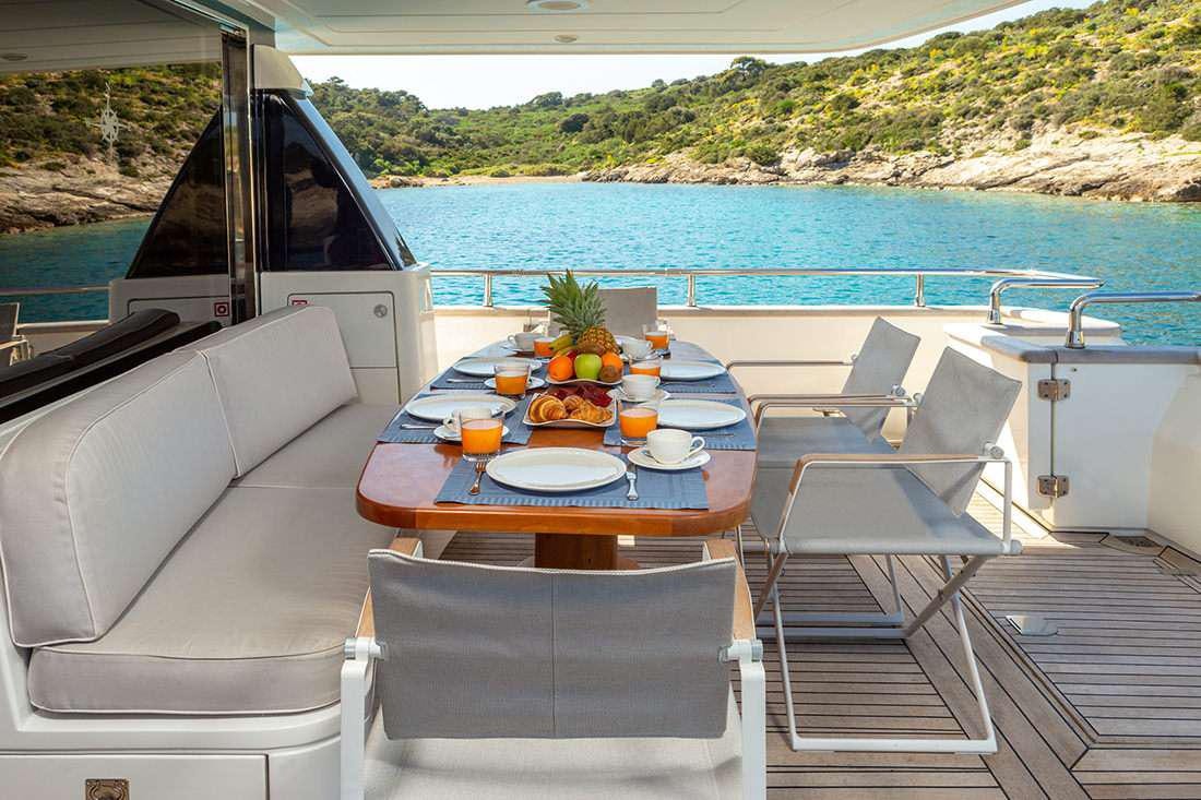 a boat on a water body aboard THE BIRD Yacht for Charter