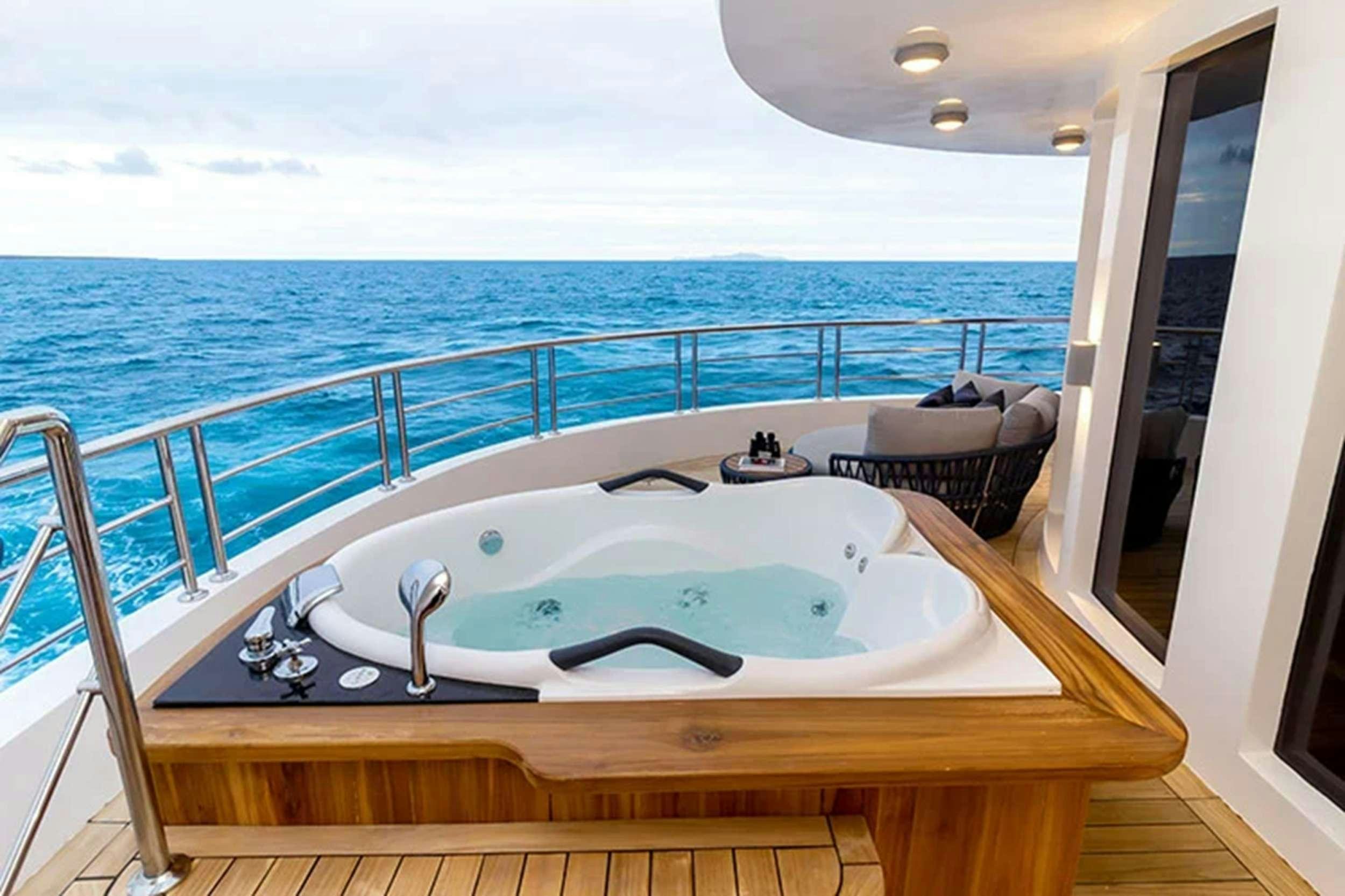 a large white tub on a boat aboard CORMORANT II Yacht for Charter