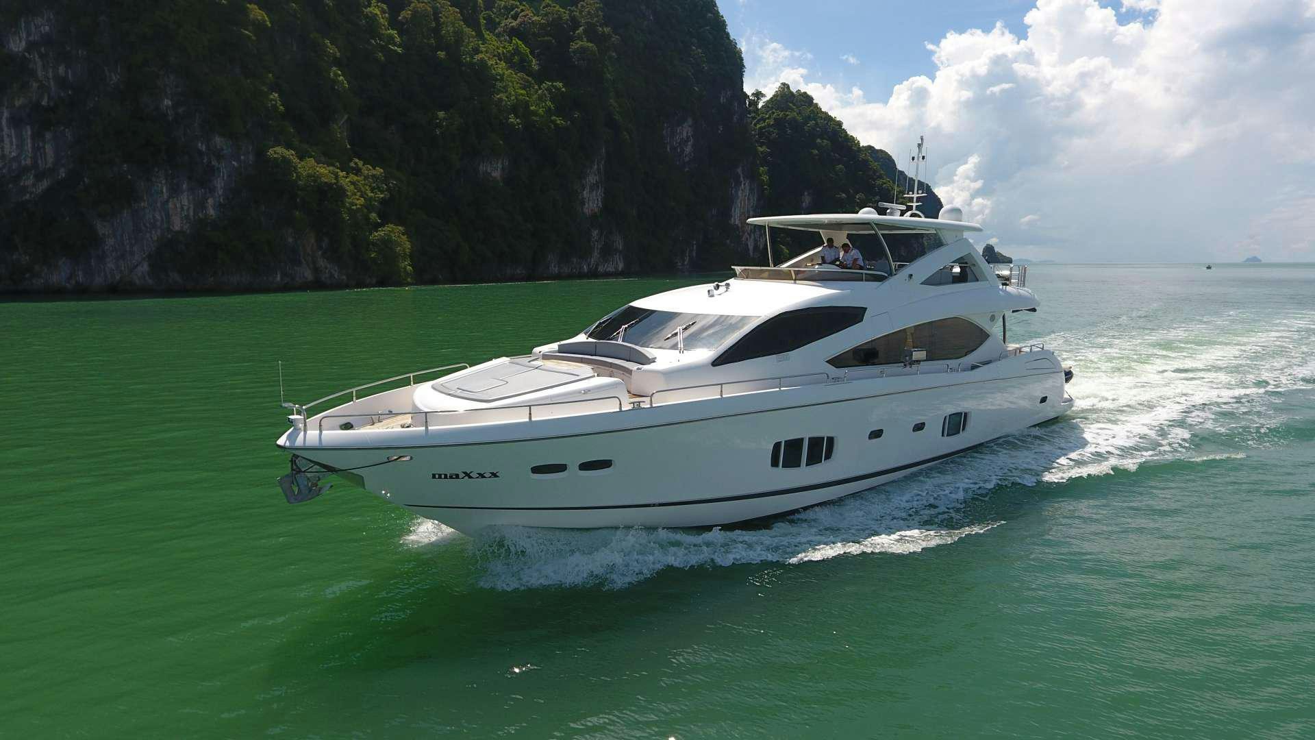 a white boat on the water aboard SYDNEY Yacht for Charter