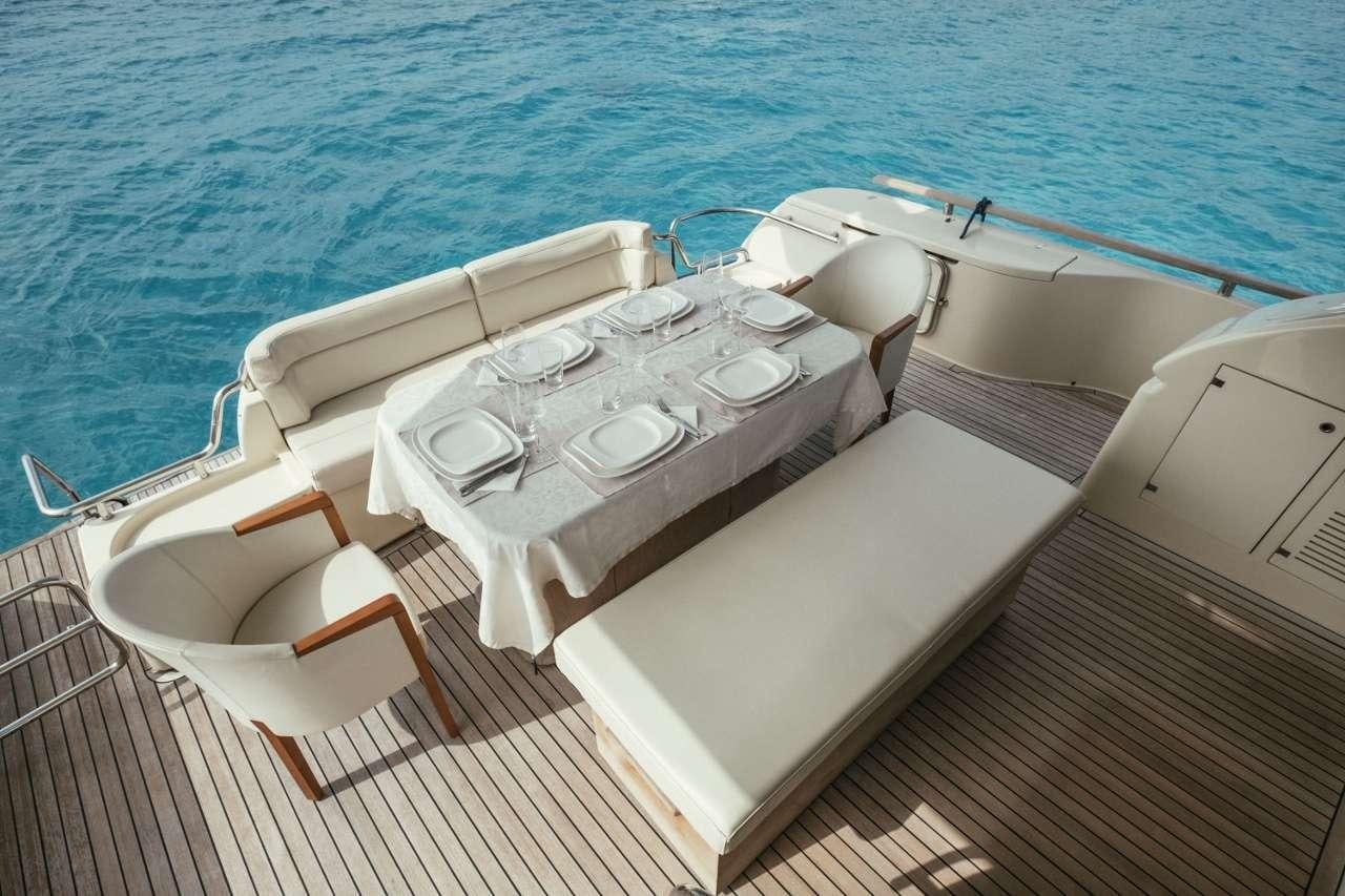 a boat on a deck aboard TO ESCAPE Yacht for Charter