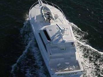 a military ship in the water aboard PRIORITY Yacht for Charter