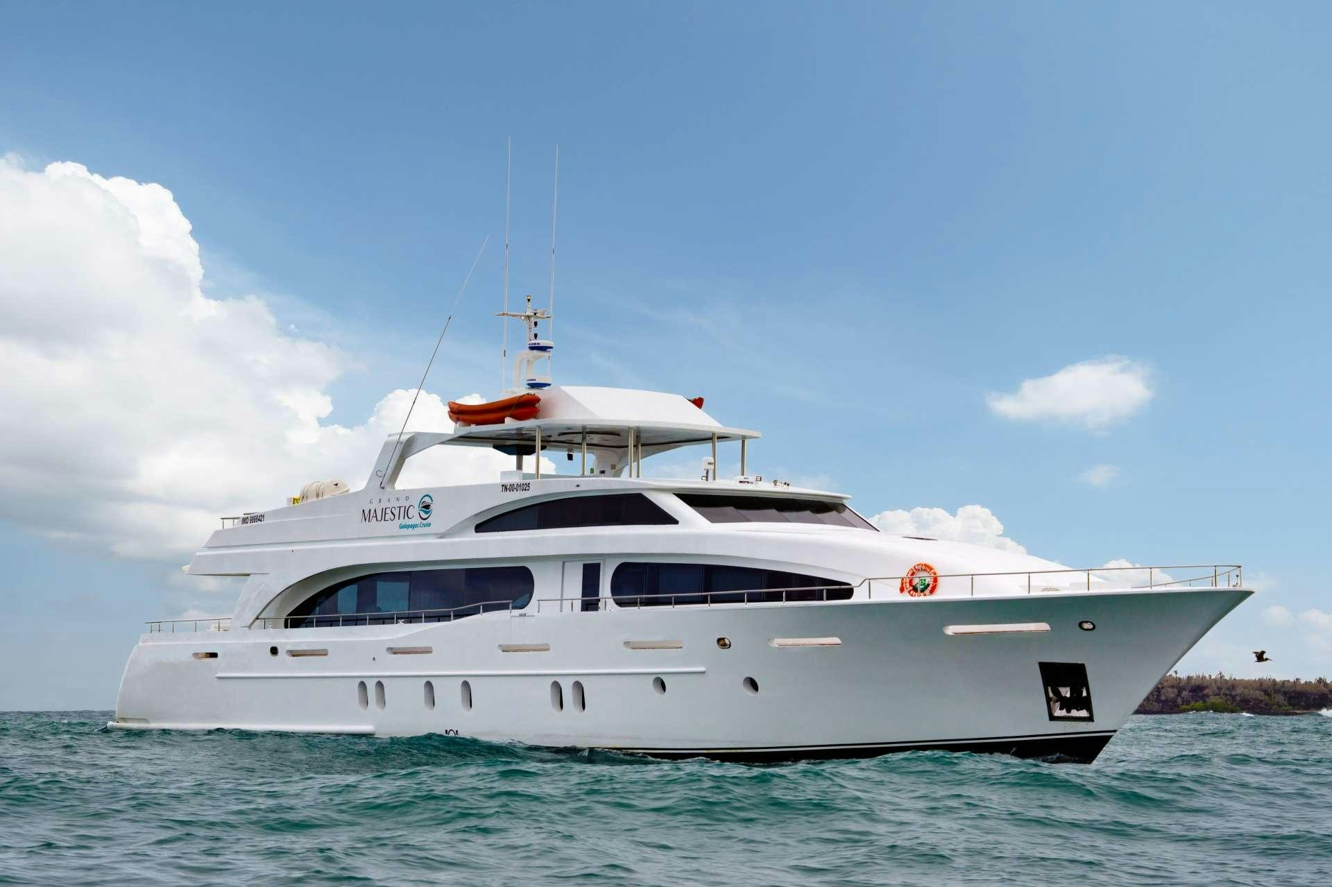 a white yacht in the water aboard GRAND MAJESTIC Yacht for Charter
