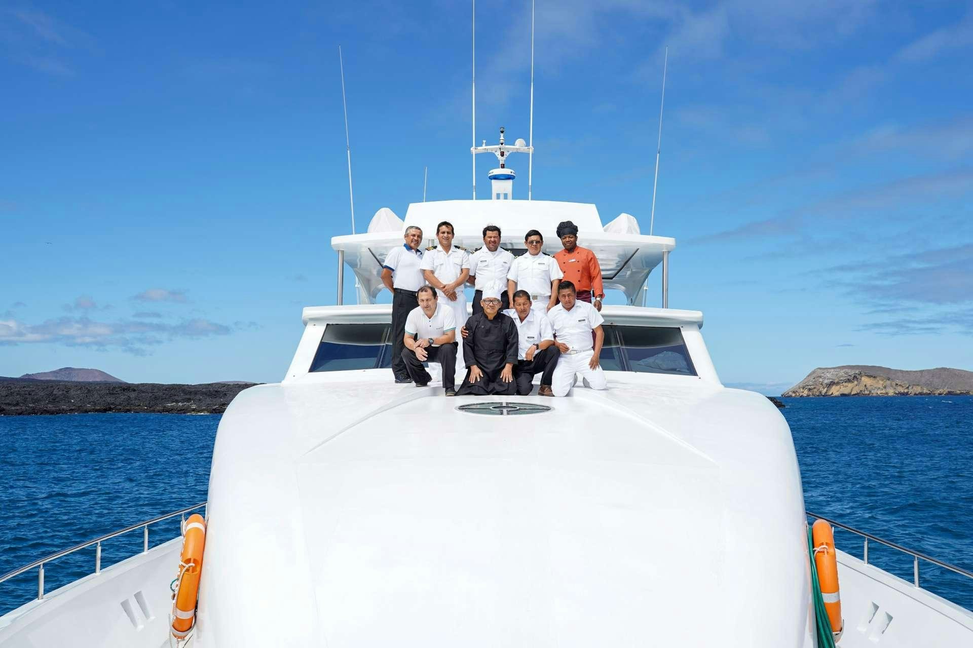 a group of people on a boat aboard GRAND MAJESTIC Yacht for Charter