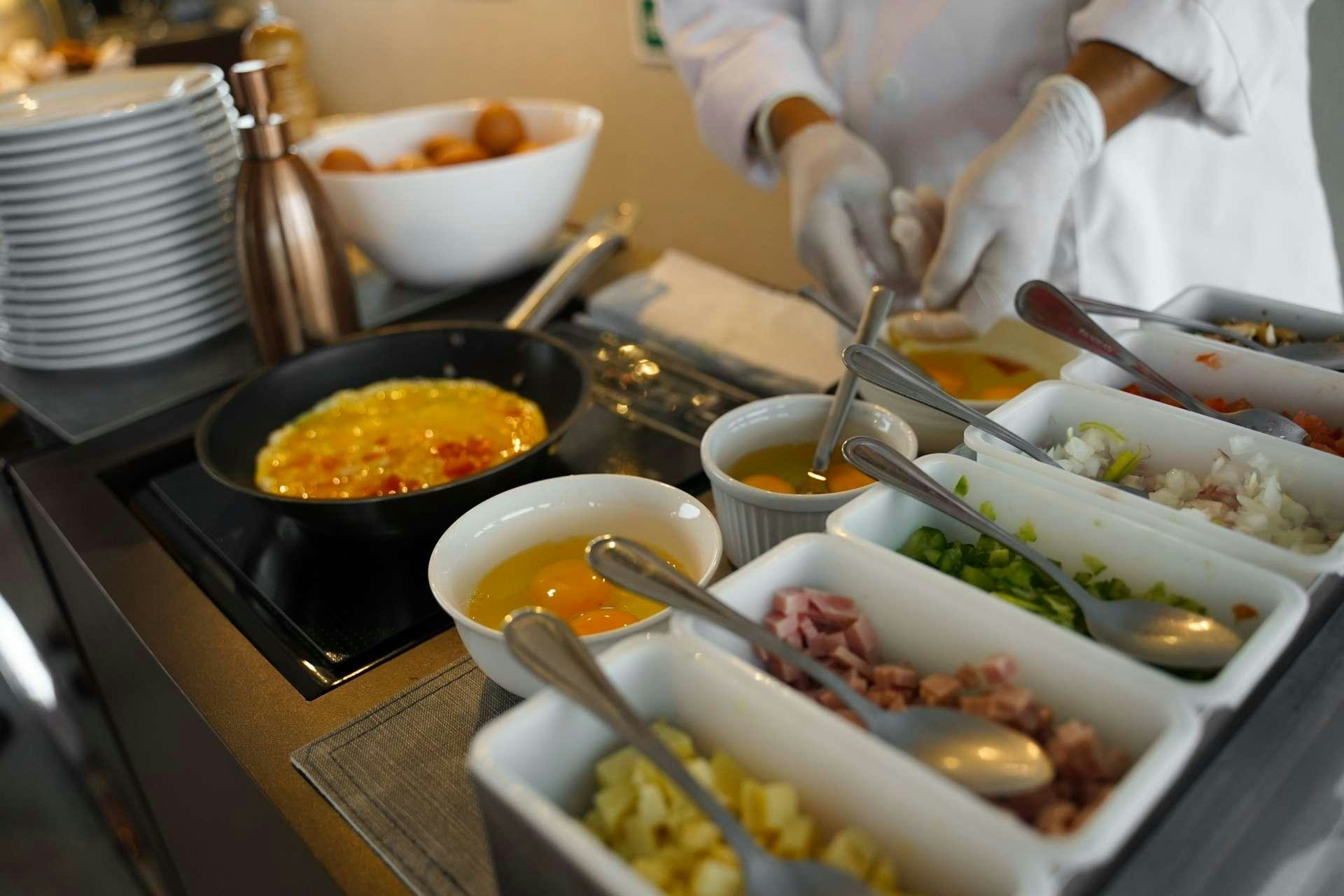 a table full of food aboard GRAND MAJESTIC Yacht for Charter