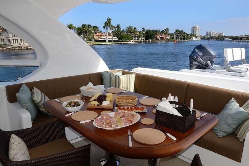 a table with food on it aboard BLUE HORIZON Yacht for Charter