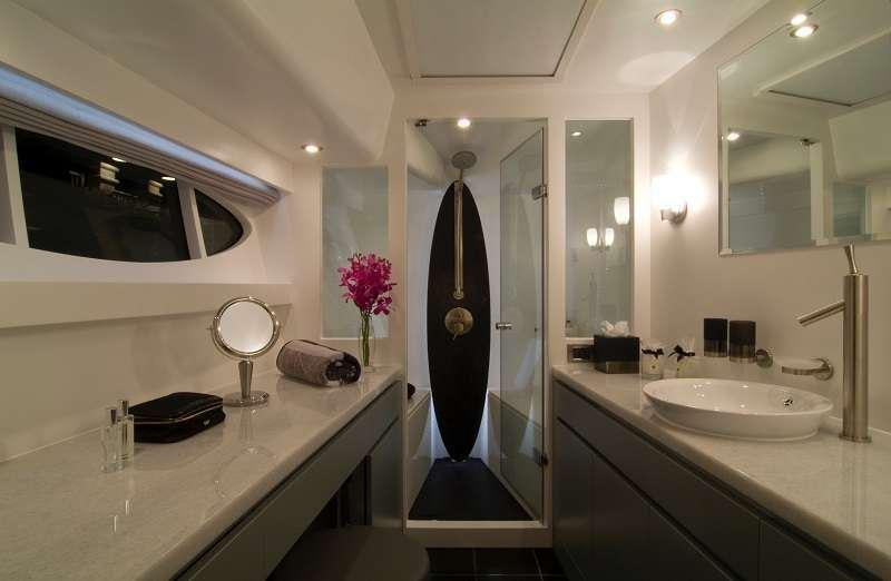 a bathroom with a stand up shower aboard BLUE HORIZON Yacht for Charter