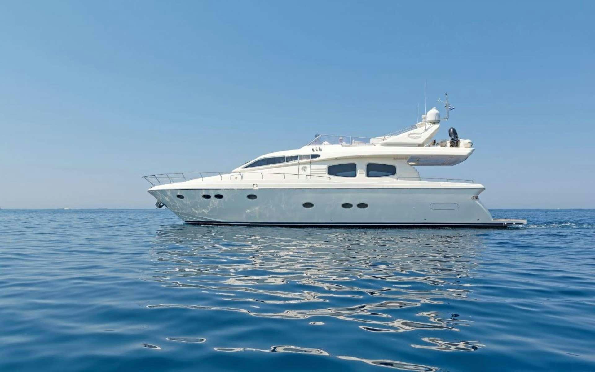 a white yacht in the water aboard LETTOULI III Yacht for Charter