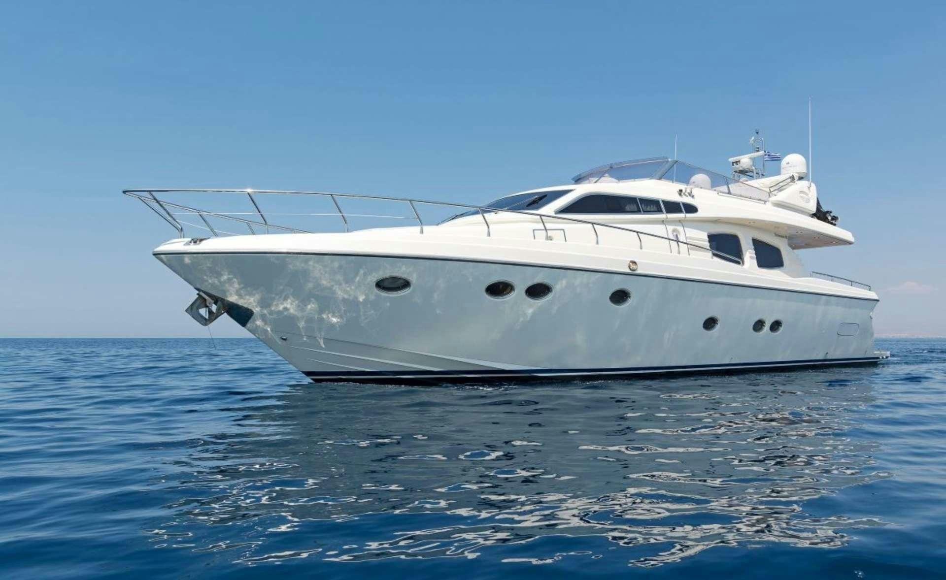 a white yacht in the water aboard LETTOULI III Yacht for Charter