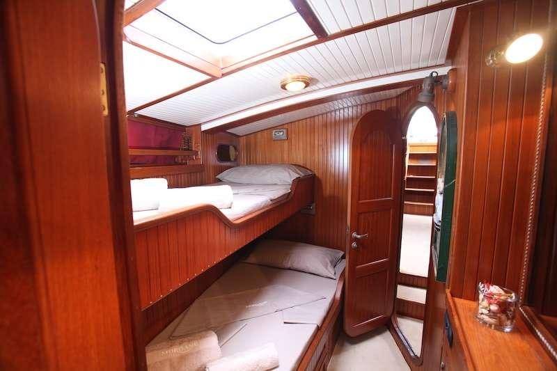 a room with two beds aboard MORGANE Yacht for Charter