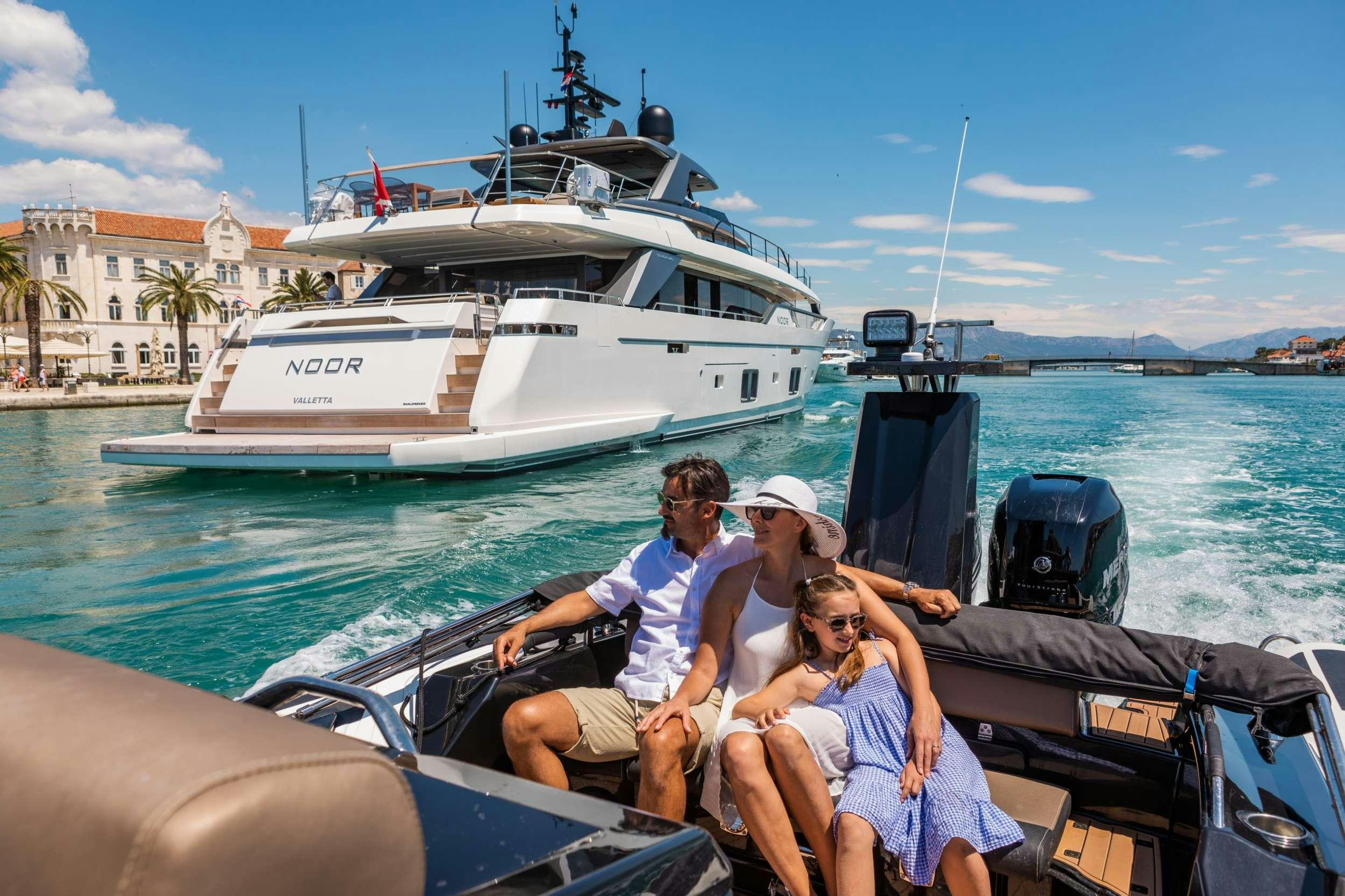 a group of people on a boat aboard NOOR II Yacht for Charter