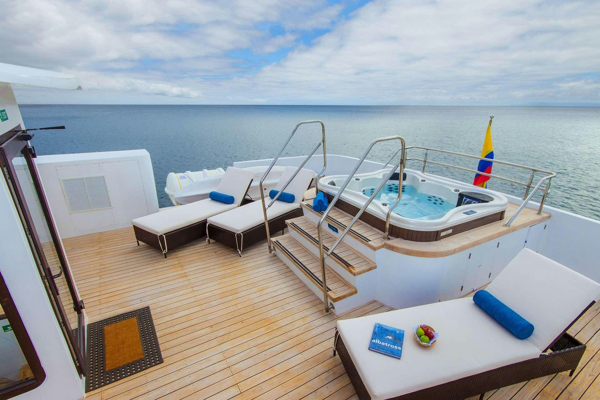 a boat on a dock aboard NATURAL PARADISE Yacht for Charter