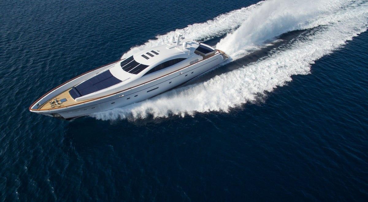 a white yacht in the water aboard MAC Yacht for Charter