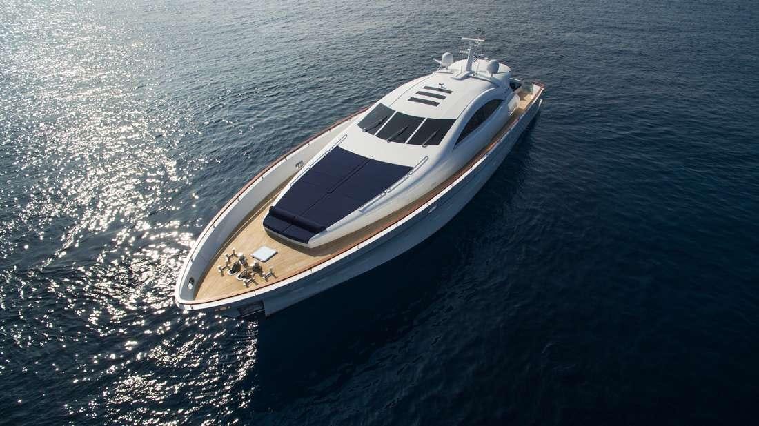 a white boat in the water aboard MAC Yacht for Charter