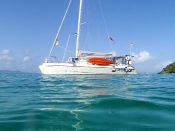 a boat in the water aboard CATALYST Yacht for Charter