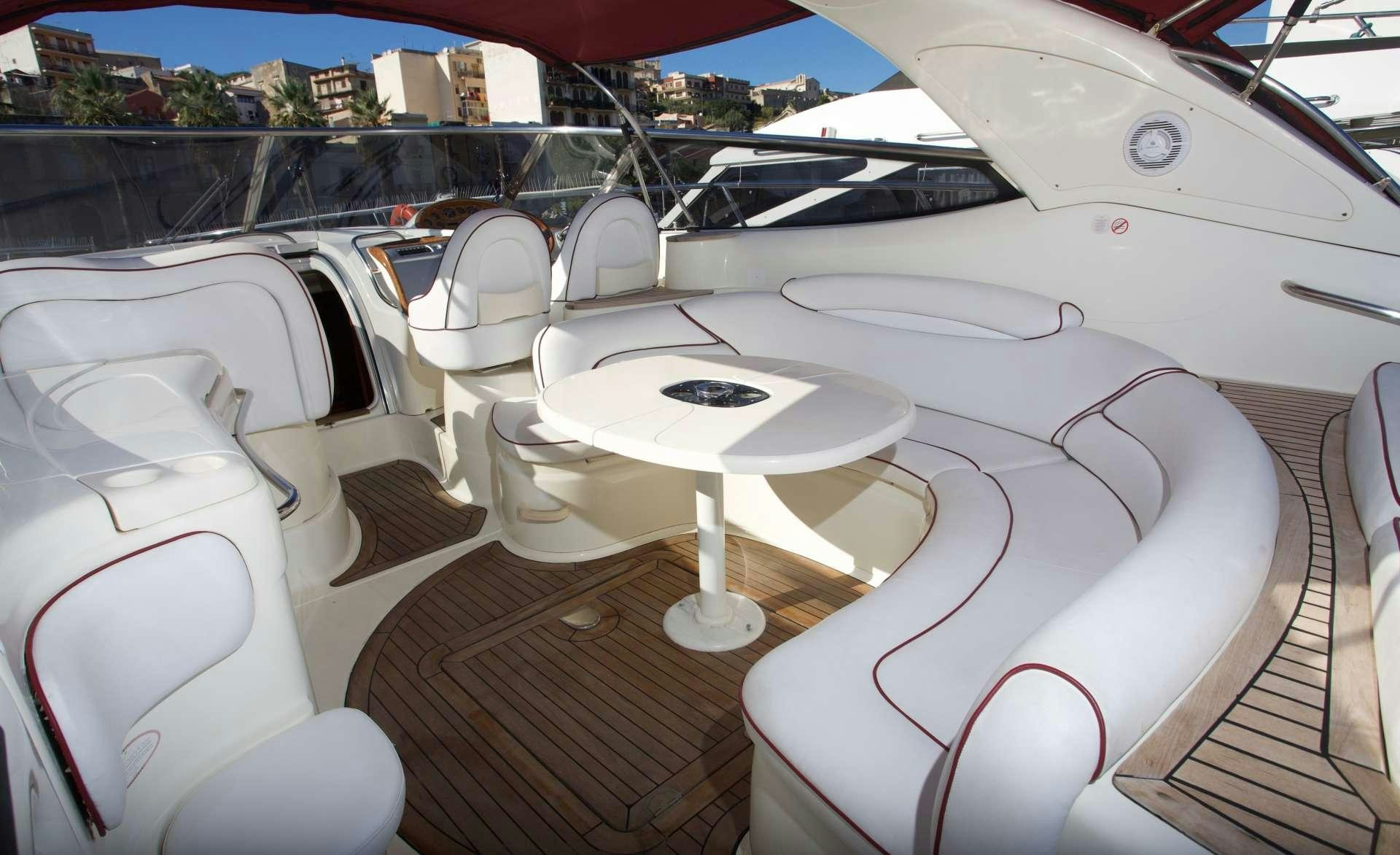 a white table on a boat aboard MAGIA Yacht for Charter