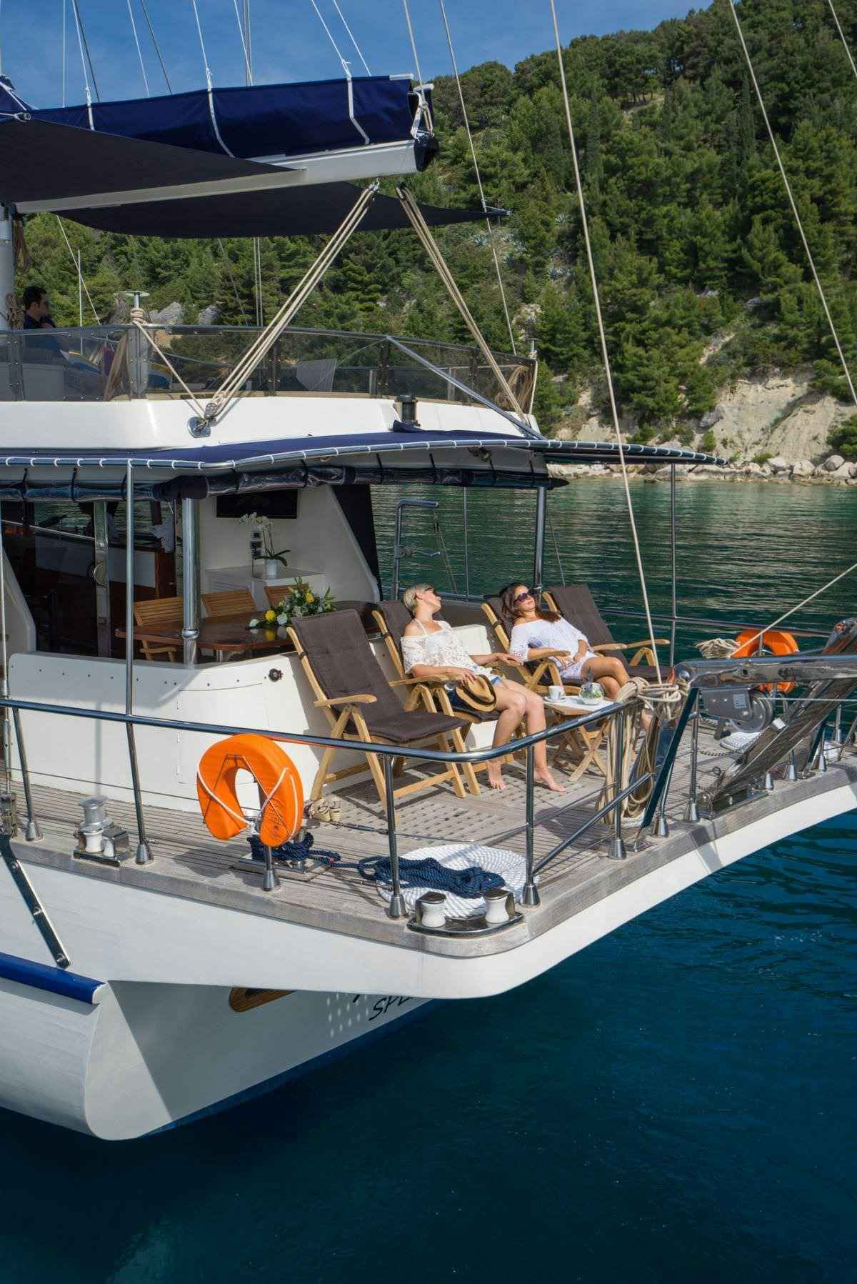a group of people on a boat aboard ALBA Yacht for Charter