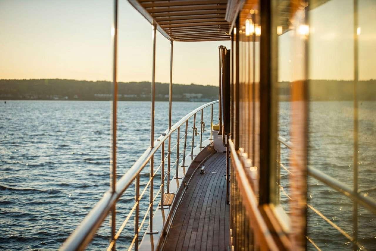 a wooden walkway over water aboard BB Yacht for Charter