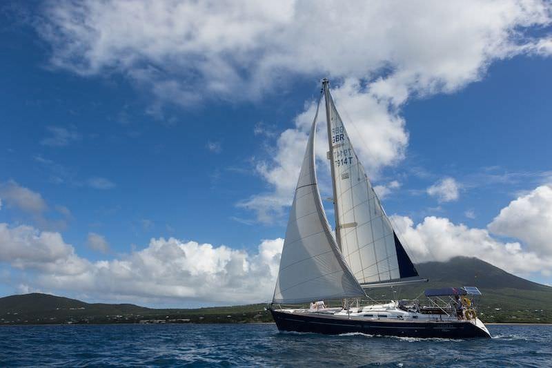 a sailboat on the water aboard HALF TIDY Yacht for Charter