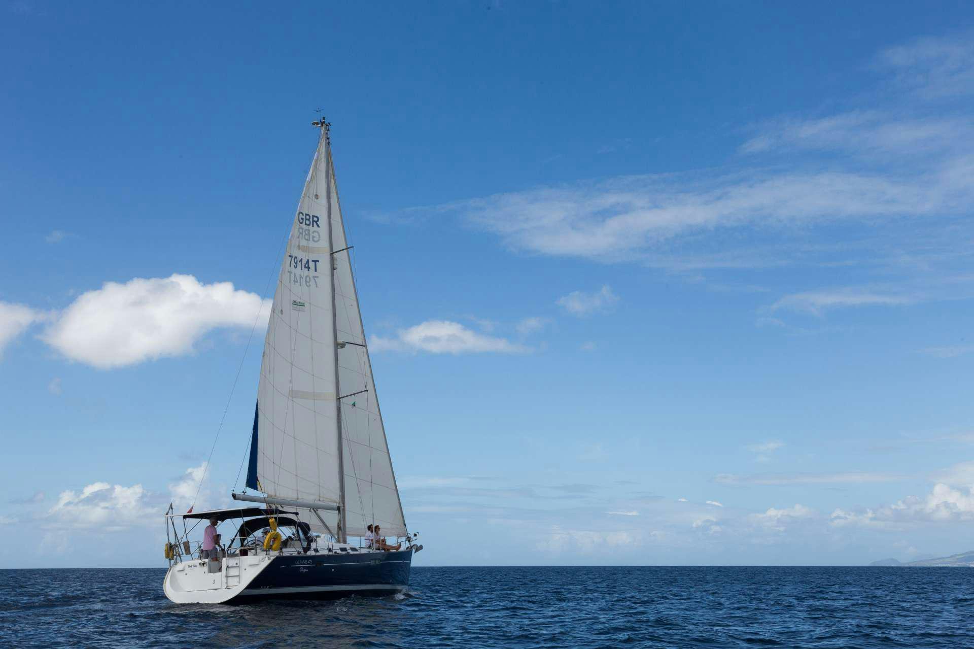 a sailboat on the water aboard HALF TIDY Yacht for Charter