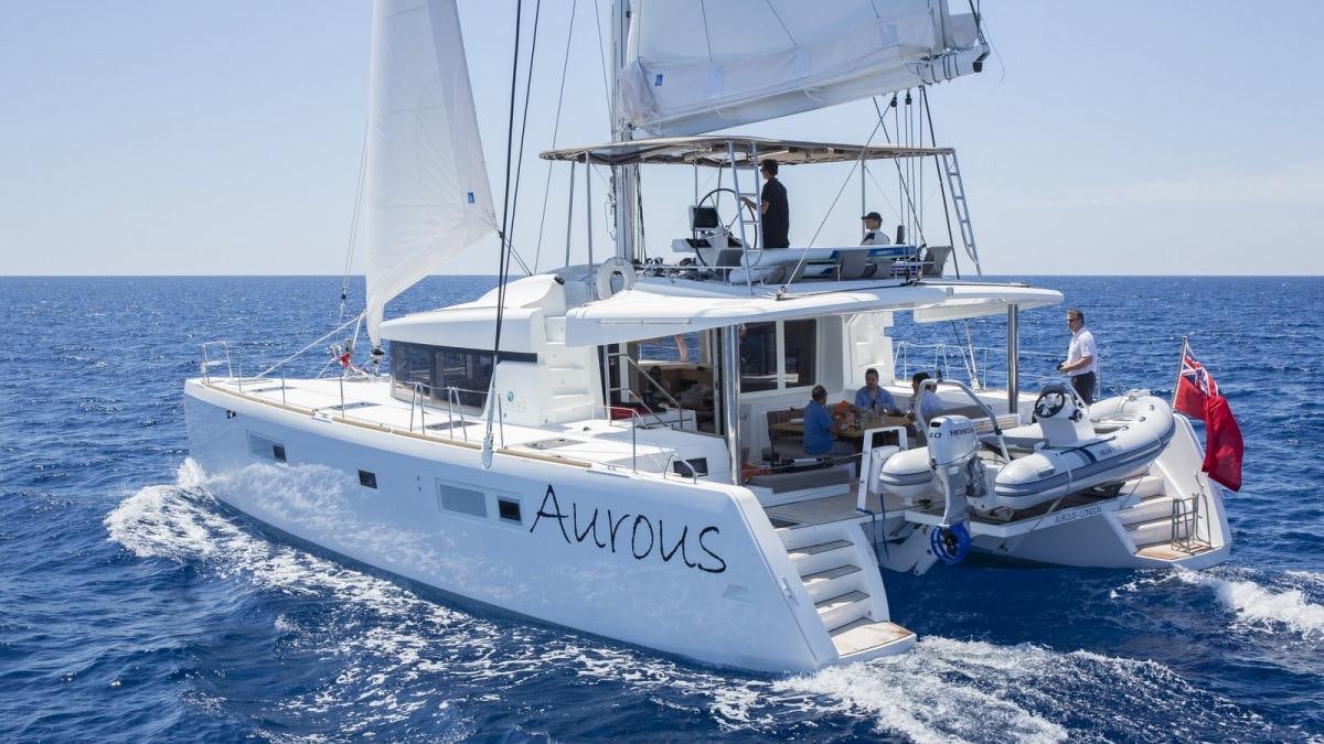 a boat with people on it aboard LAGOON 52 Yacht for Charter