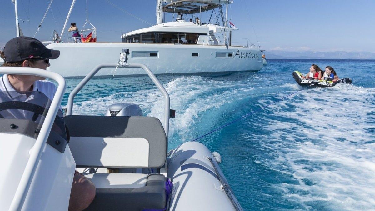 people on a boat aboard LAGOON 52 Yacht for Charter