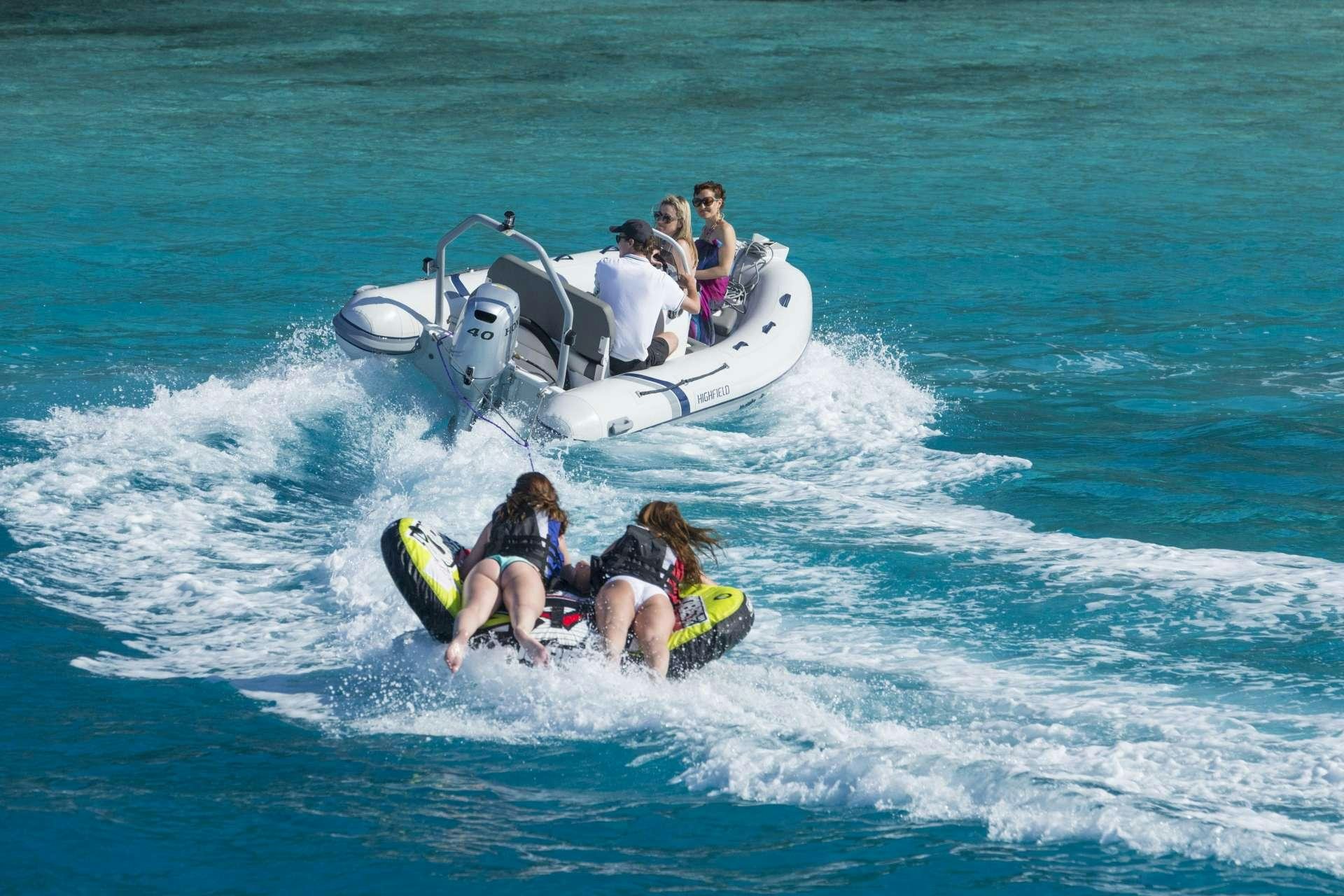 a group of people on a boat aboard LAGOON 52 Yacht for Charter