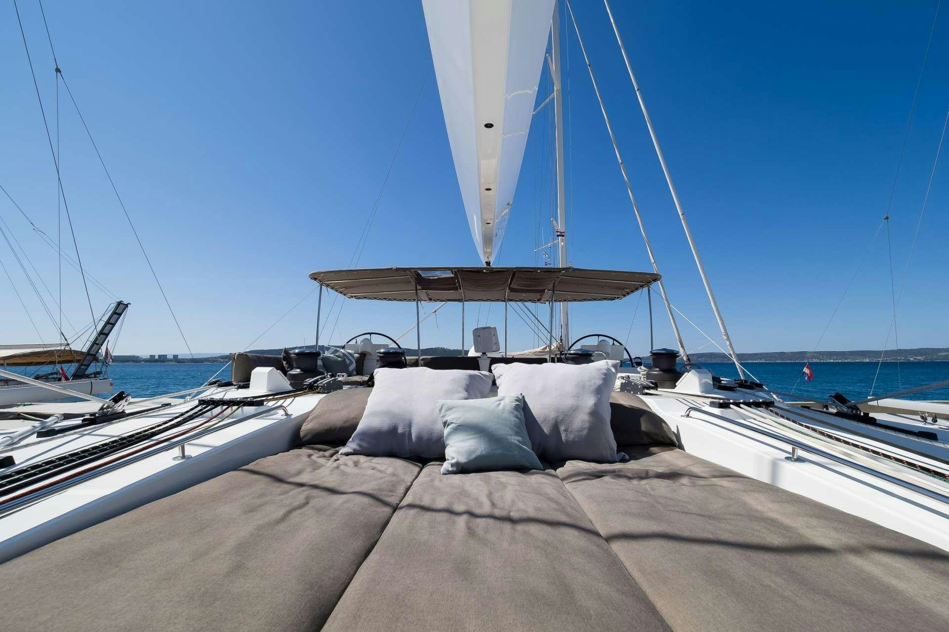 a boat docked at a pier aboard TWIN Yacht for Charter