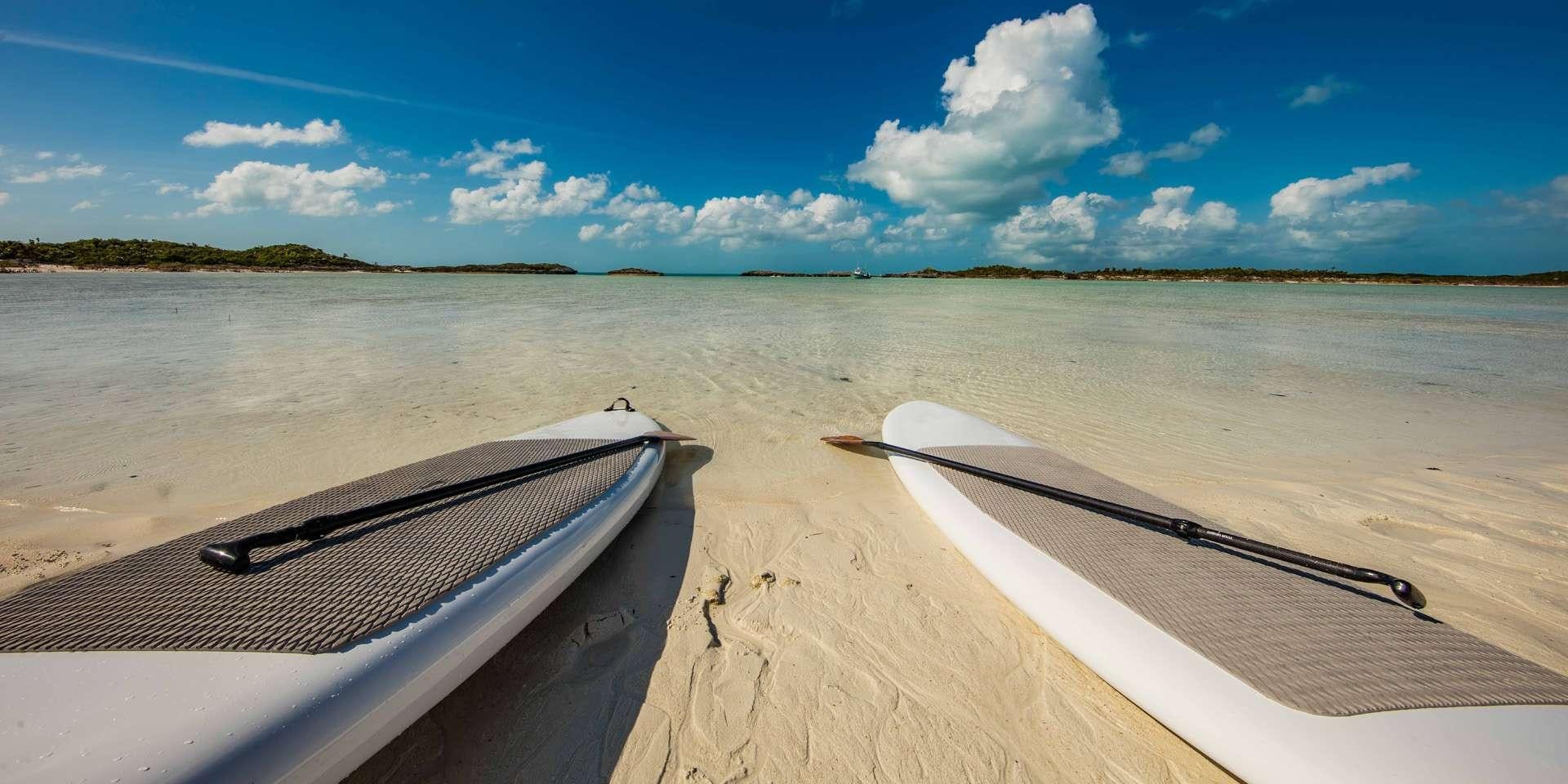a boat on a beach aboard RENA Yacht for Charter