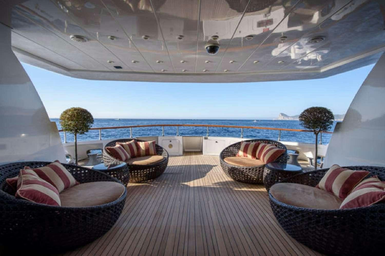 a room with a large window and a view of the ocean aboard PAULA III Yacht for Charter