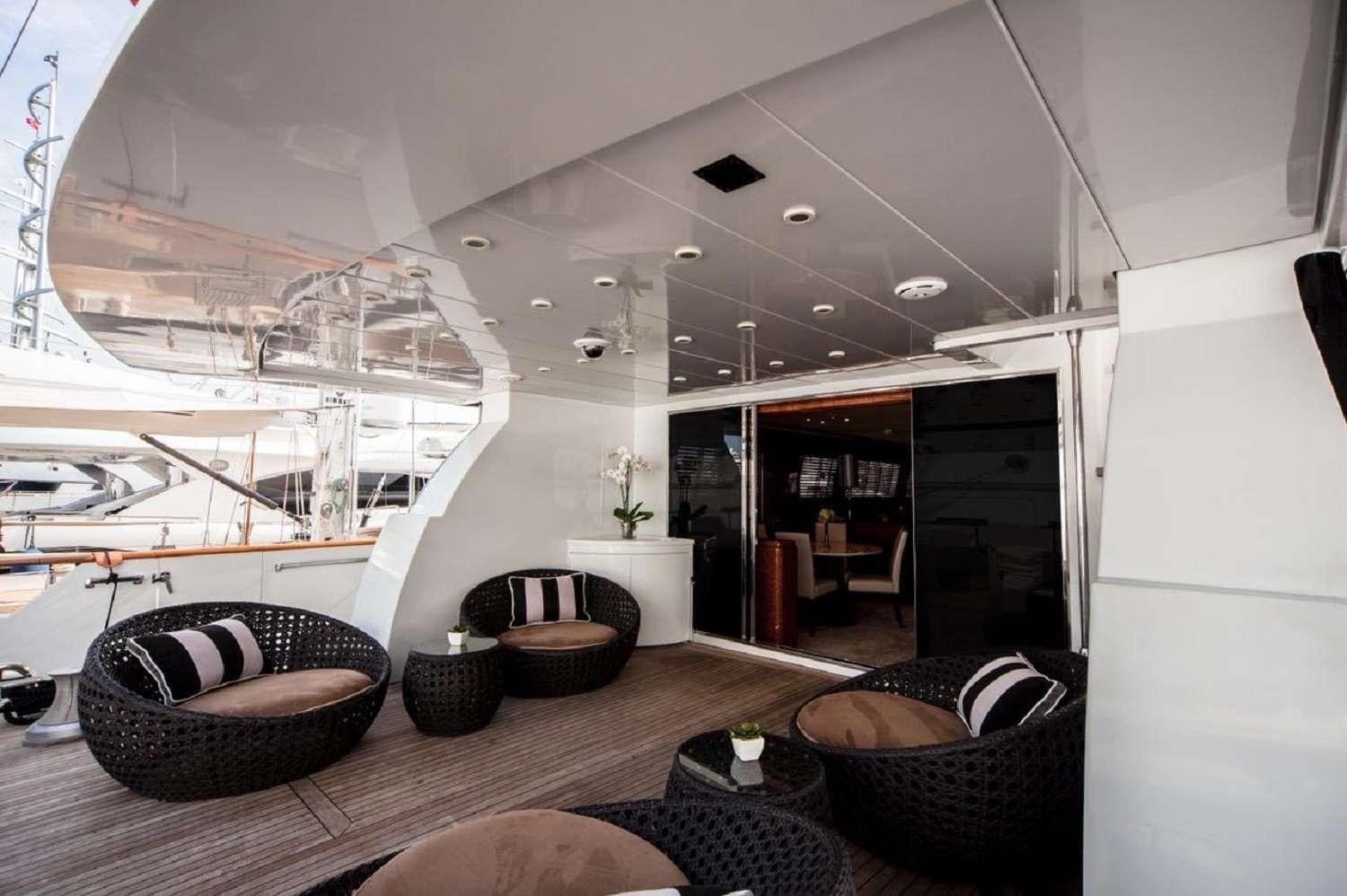a room with a large ceiling aboard PAULA III Yacht for Charter