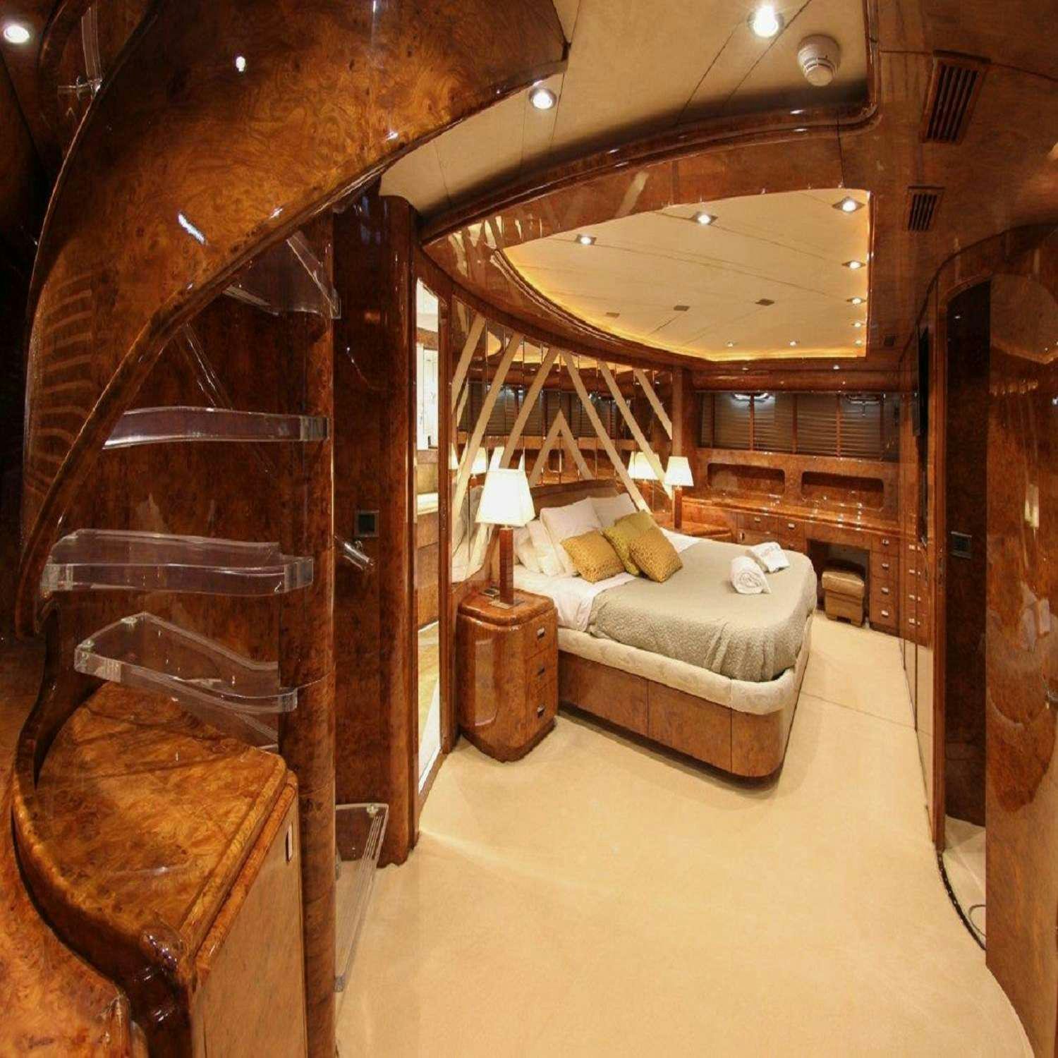 a living room with a large mirror aboard PAULA III Yacht for Charter