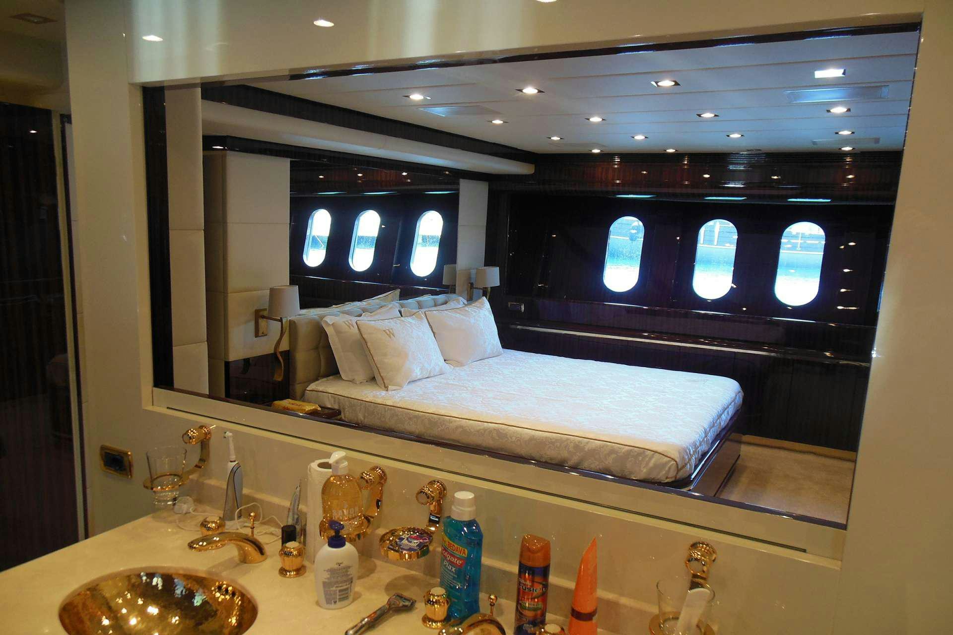 a large bed in a room aboard WHITE PEARL Yacht for Charter