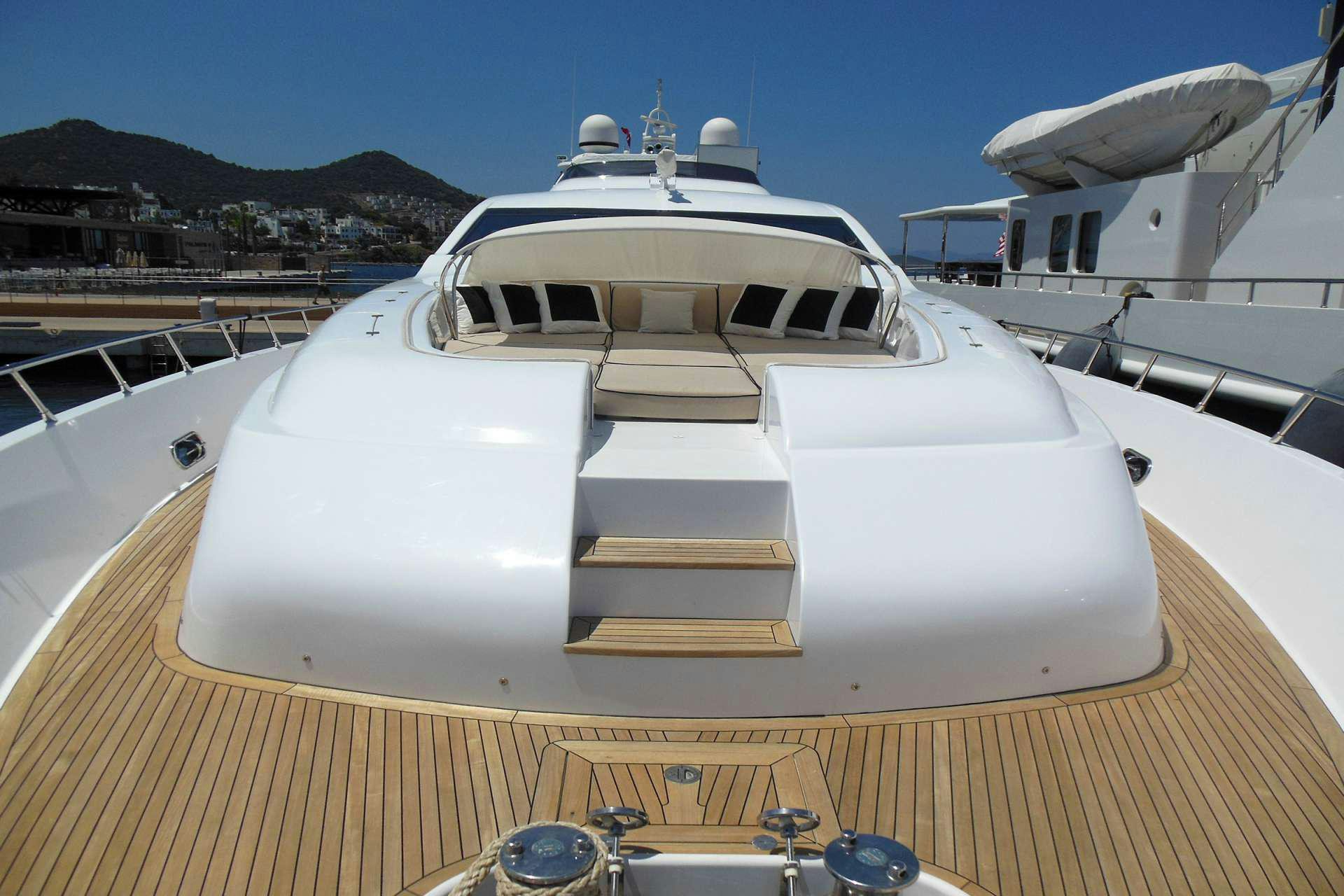 a white yacht on a deck aboard WHITE PEARL Yacht for Charter