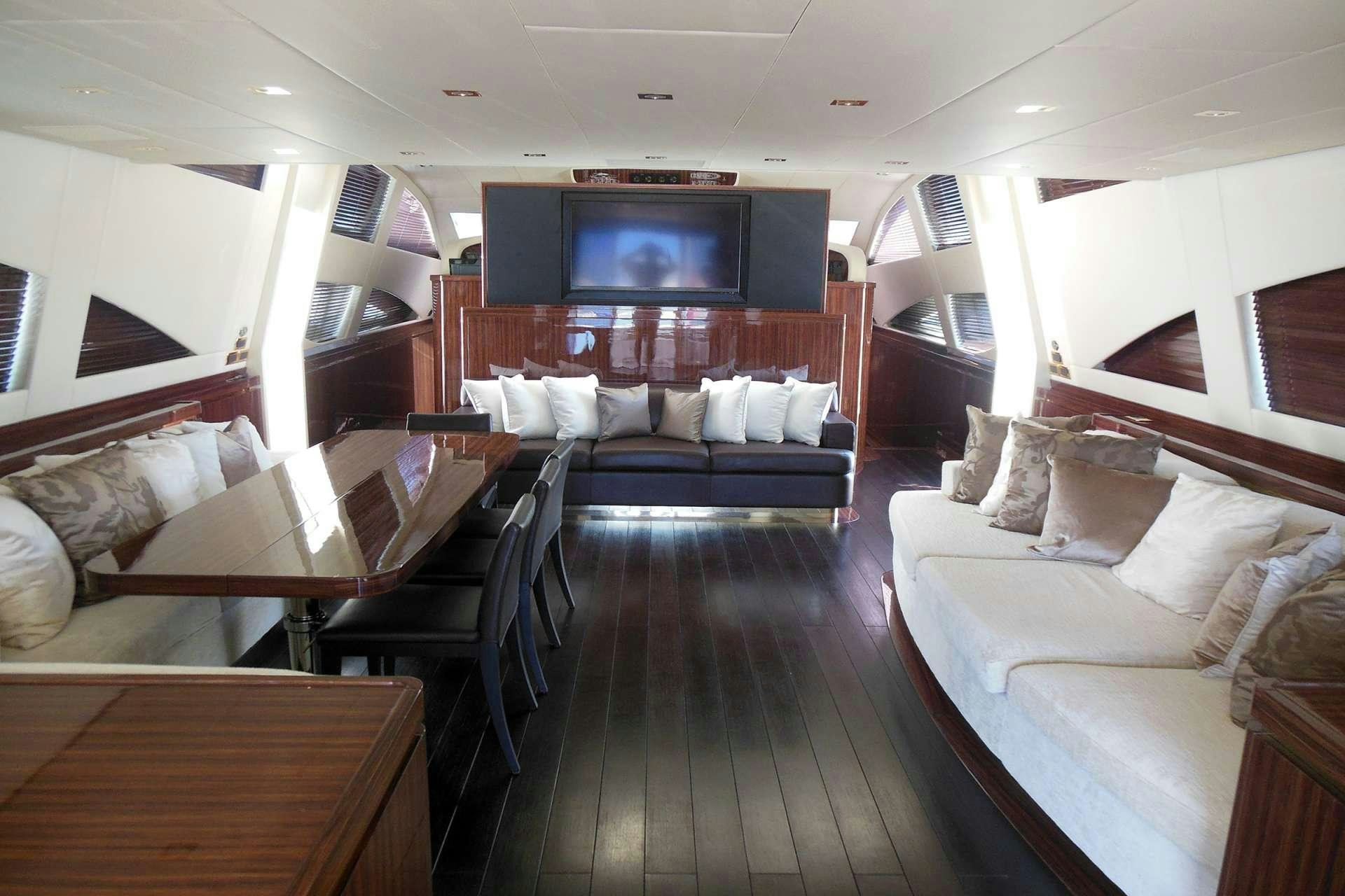 a living room with a wood floor aboard WHITE PEARL Yacht for Charter