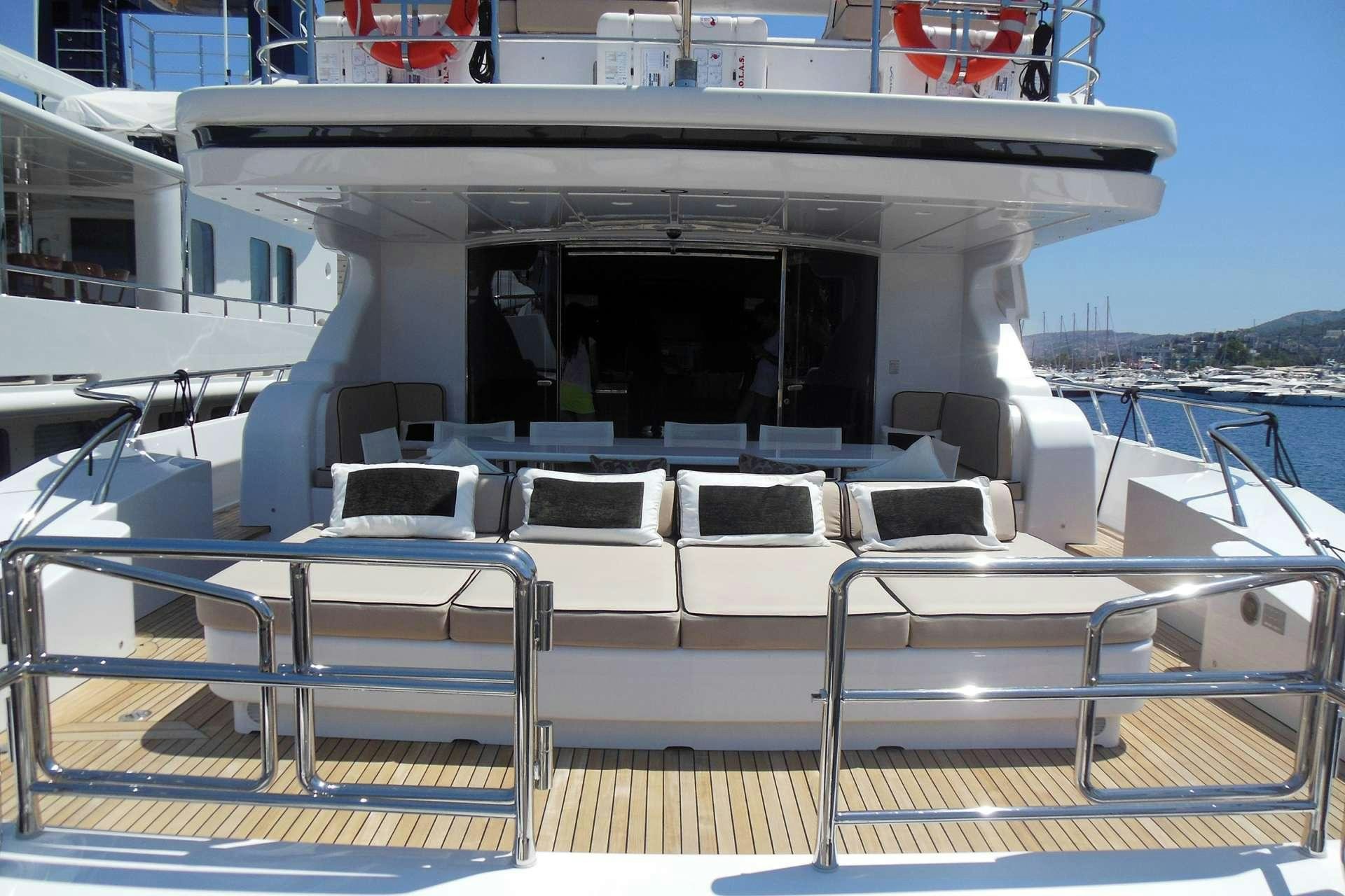 a boat with chairs on the deck aboard WHITE PEARL Yacht for Charter