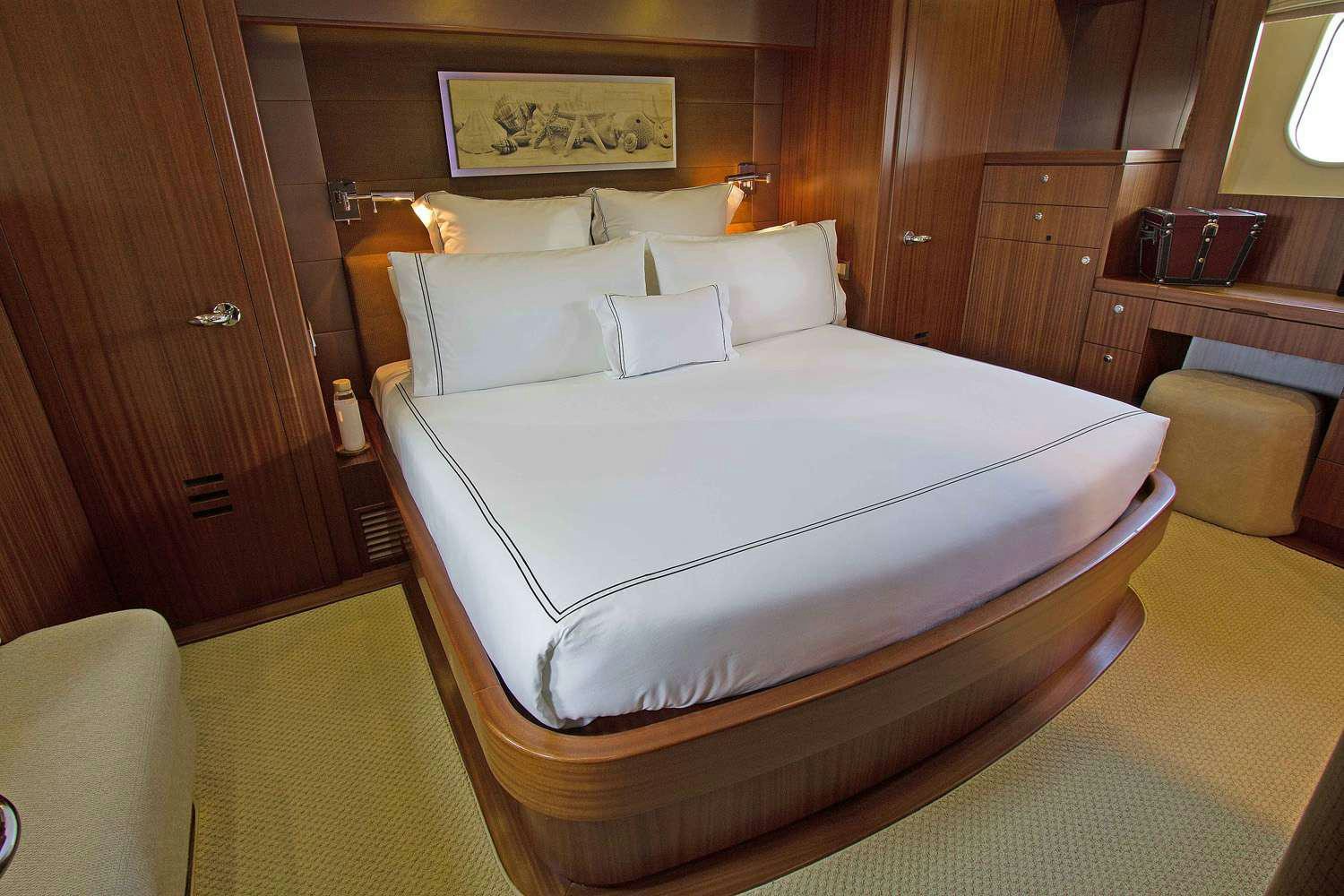 a bed in a room aboard JUS CHILL'N Yacht for Charter