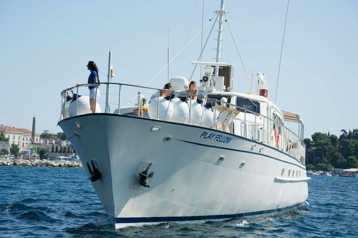 a boat with people on it aboard Play Fellow Yacht for Charter