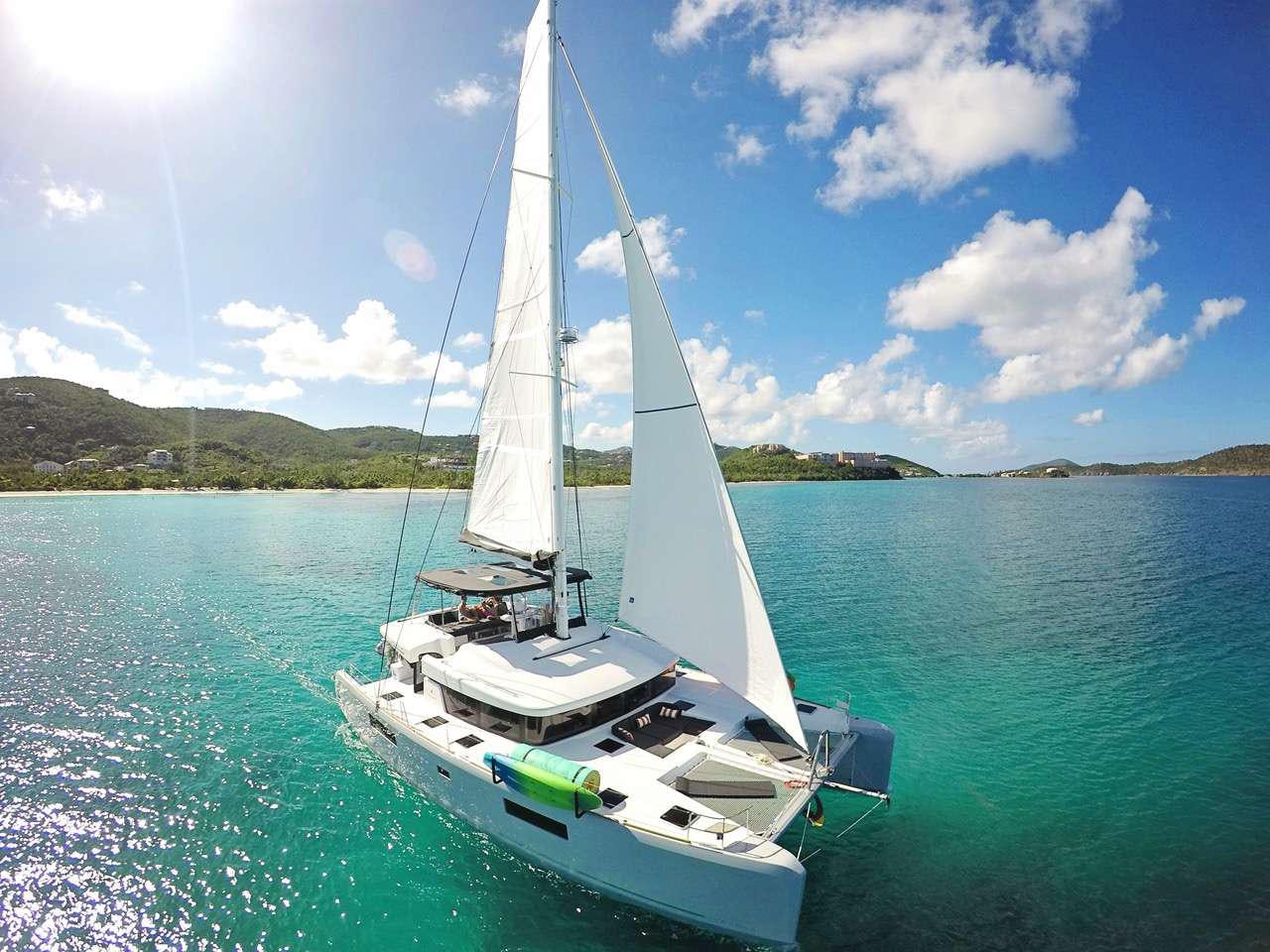 a sailboat on the water aboard ISLAND HOPPIN' Yacht for Charter