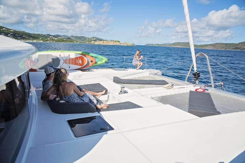people sitting on a boat aboard ISLAND HOPPIN' Yacht for Charter