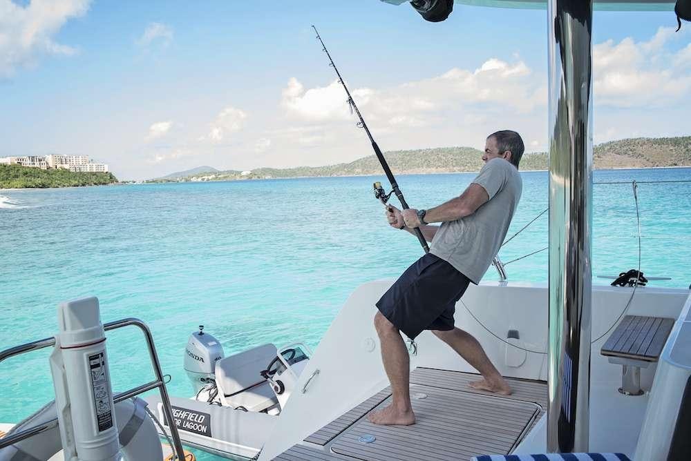 a person on a boat aboard ISLAND HOPPIN' Yacht for Charter