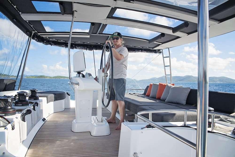 a person on a boat aboard ISLAND HOPPIN' Yacht for Charter