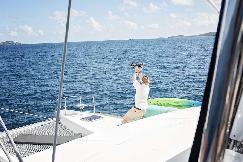 a person on a boat aboard ISLAND HOPPIN' Yacht for Charter